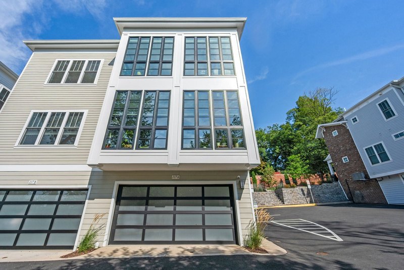 Attached two-car garage plus a reserved space